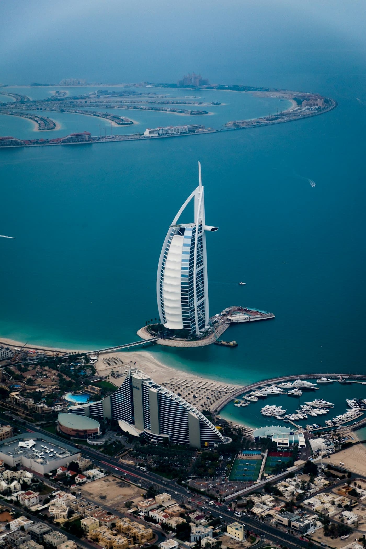 Dubai Marina towers at dusk representing UAE real estate app development